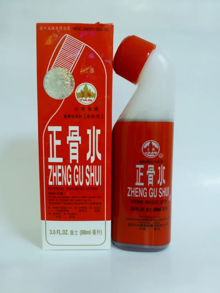 Zheng Gu Shui (w/applicator brush) - Yulin Brand curved-neck bottle with 3 fluid ounces (88 milliliters), english and chinese text.