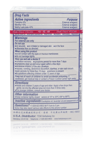 Minyak Angin White Flower Embrocation box panel showing drug facts including active ingredients, applications, warnings, directions, care and storage, inactive ingredients, and contact information.