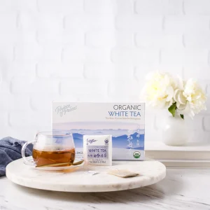 image of box and a brewed cup of Prince of Peace White tea