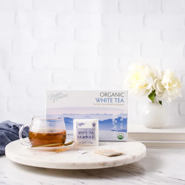 image of box and a brewed cup of Prince of Peace White tea