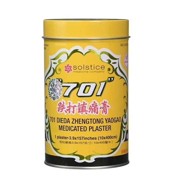 Bright yellow can containing one long roll of medicated plaster (pain patch) 3.9 inches wide by 157 inches long. Brand is Solstice Medicine Company. Chinese and English text on can.