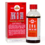 Bottle of 100 milliliters of healing liniment. Box contains product use and precautions, in english, french, and chinese.