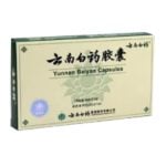 Pale yellow and green box with Chinese and English labels. Text: Yunnan Baiyao Capsules.